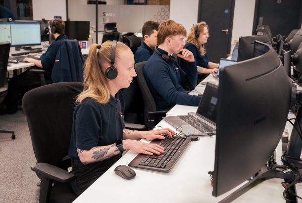 Apprentices working at desk